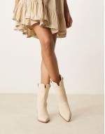 western ankle boots in washed pink