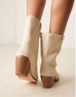 western ankle boots in washed pink